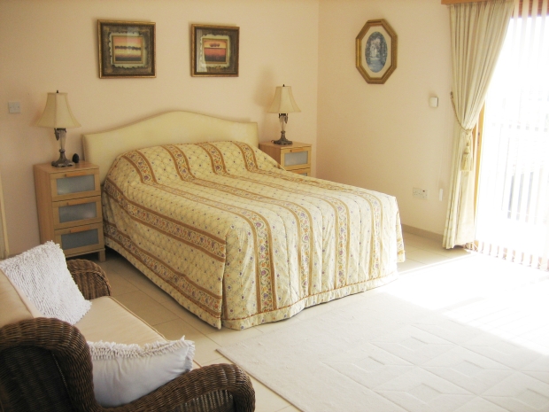 Master Bedroom leading to Balcony with Sea Views